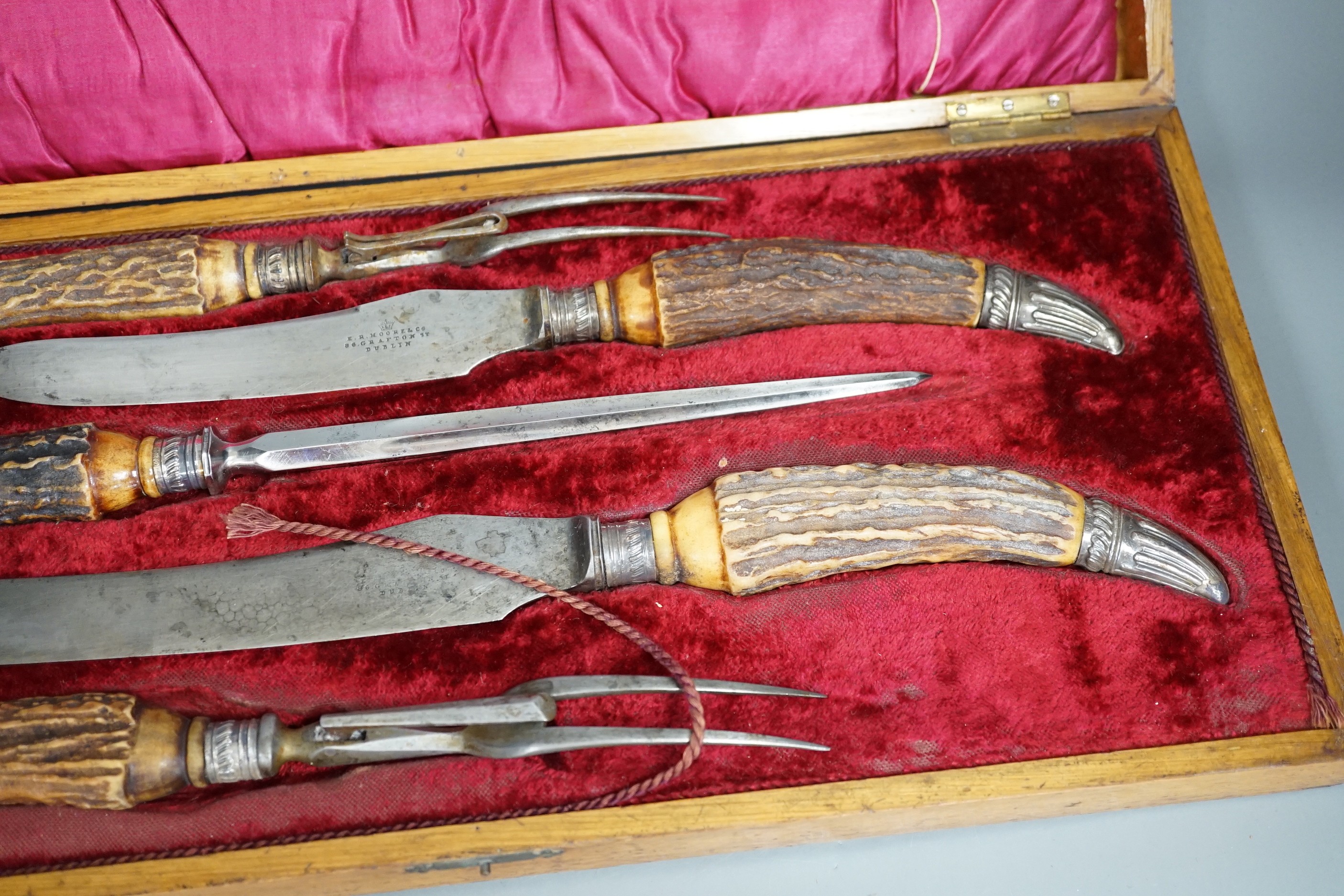 A Victorian E.R. Moore & Co. cased horn handled five piece carving set